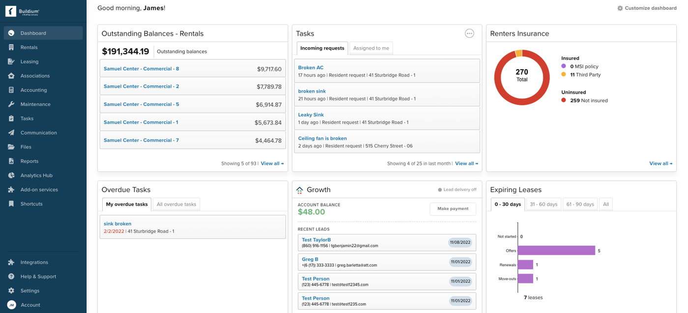 Buildium dashboard showing outstanding balances, tasks, renters insurance, and expiring leases