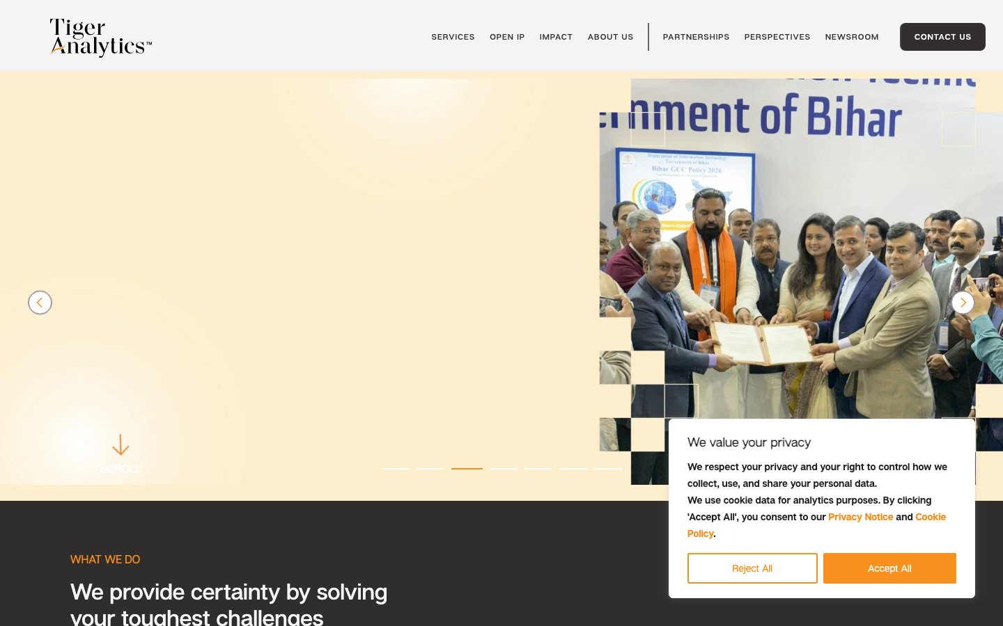 Tiger Analytics homepage showing AI and advanced analytics enterprise solutions with client logos