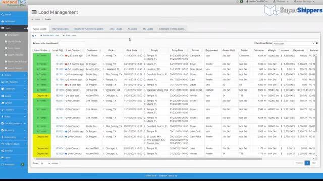 AscendTMS load management grid with color-coded load status rows and pickup, drop, and driver columns