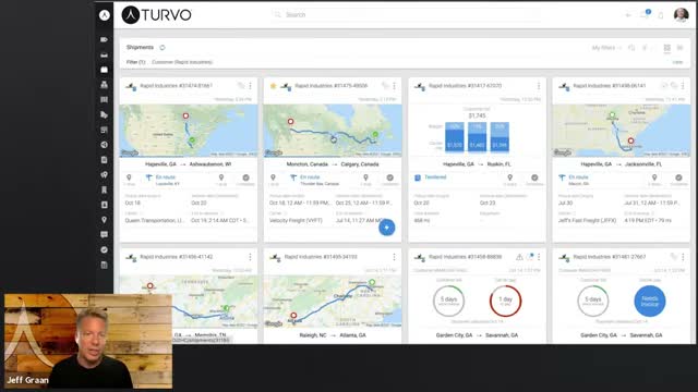 Turvo shipments card grid showing mini route maps, carrier names, and status badges for several active loads
