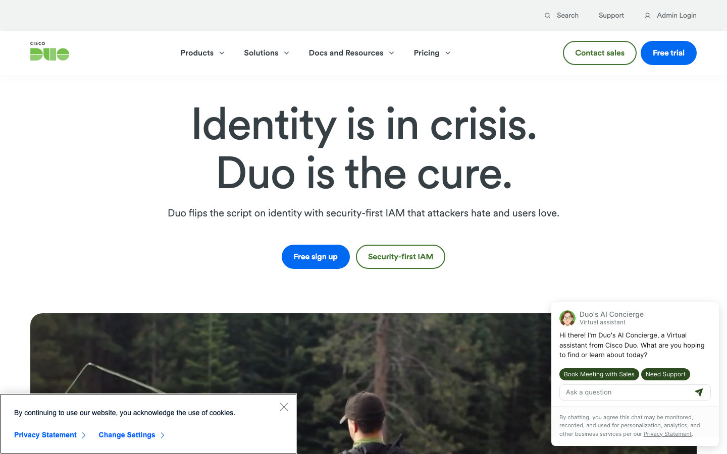 Cisco Duo homepage showing zero-trust security platform with MFA push notification interface