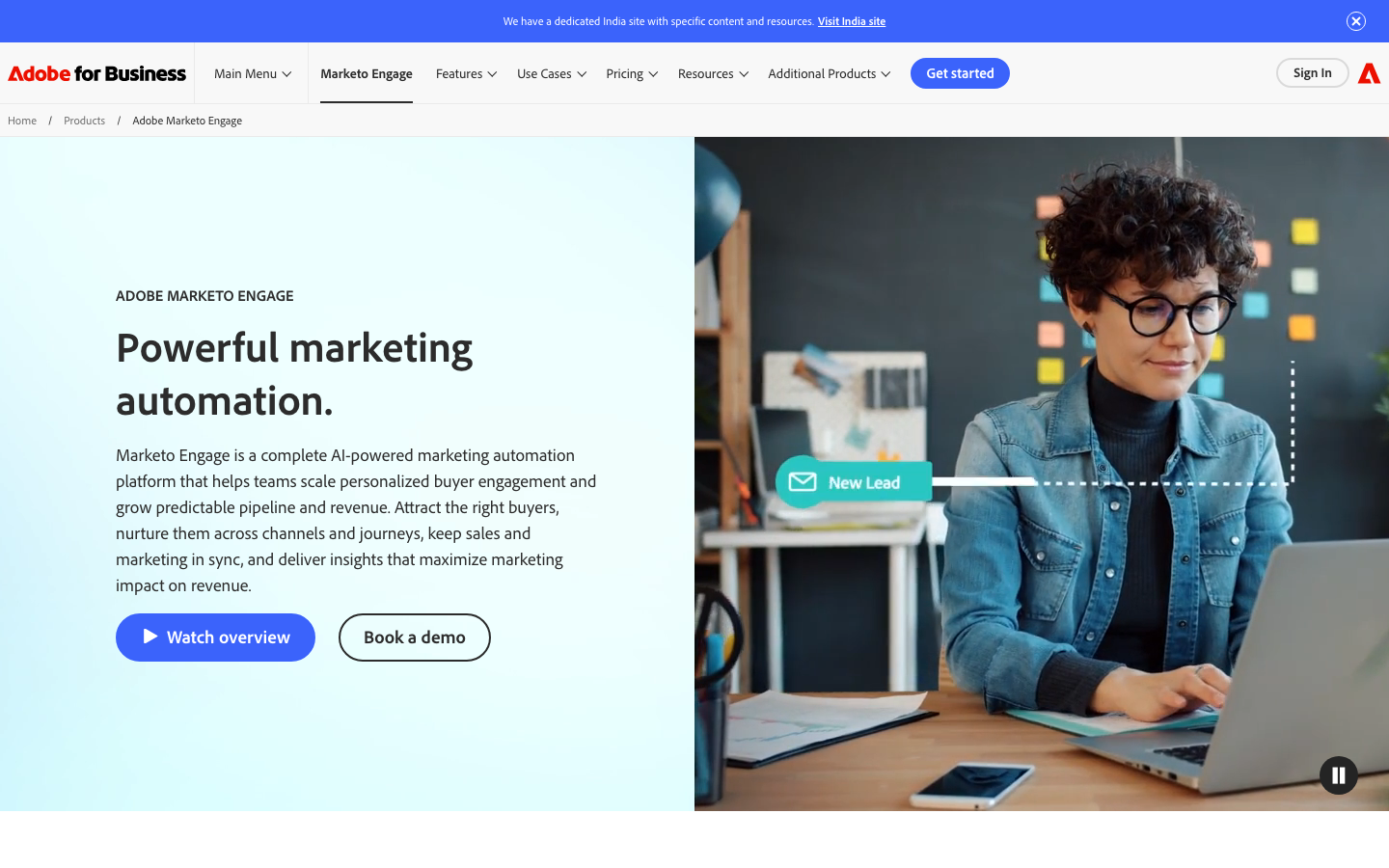 Adobe Marketo Engage homepage showing powerful marketing automation headline with book-a-demo CTA