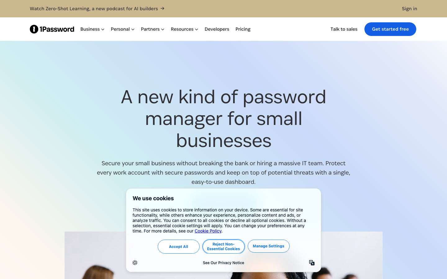 1Password business homepage showing password manager for small business with cookie consent overlay