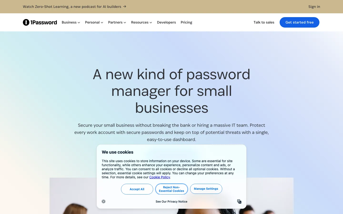 1Password business homepage showing password manager for small business with cookie consent overlay